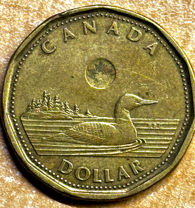 2012 $1 Coin Canada raised edge spot.png